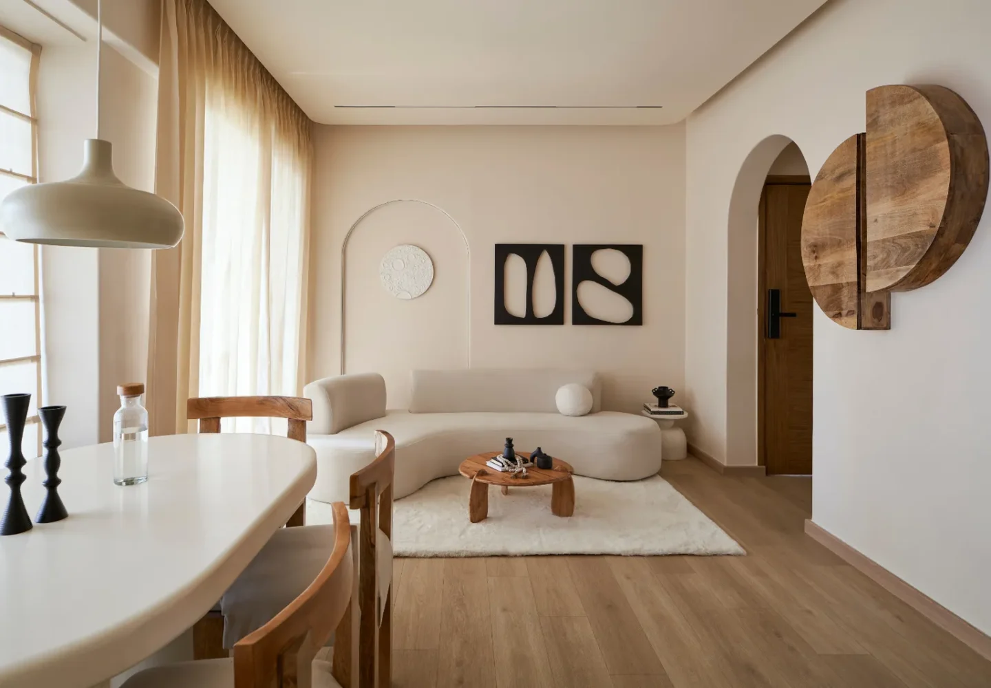 Minimalist living room with clean lines, neutral tones, and simple decor