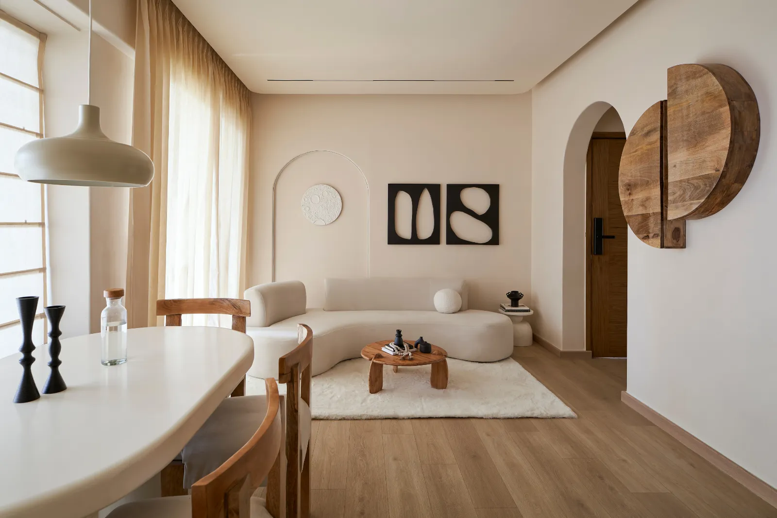 Minimalist living room with clean lines, neutral tones, and simple decor