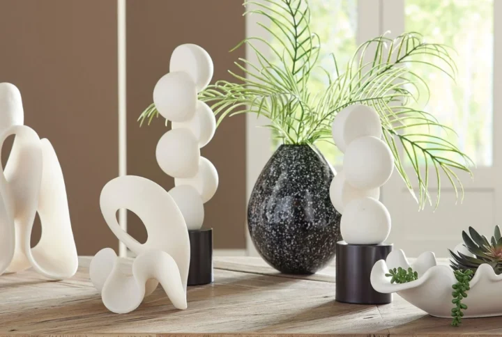 Decorative accessories including art, mirrors, lighting fixtures, plants, and decorative objects for stylish interiors